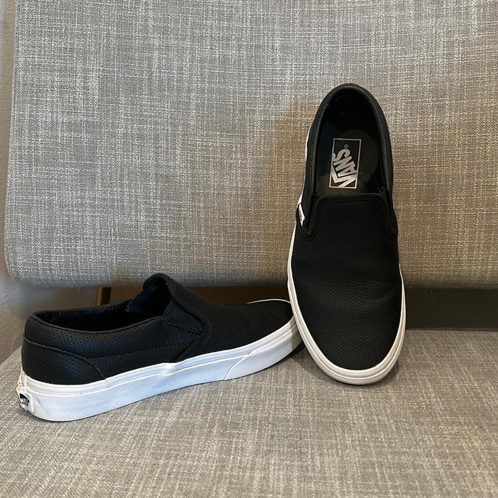 Vans perforated black leather slip on